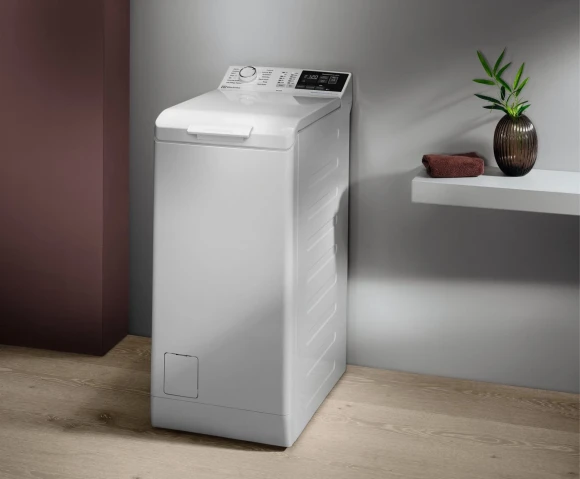 Стиральная машина Electrolux EW7T4272E пан.англ. класс: A загр.вертикальная макс.:7кг белый Стиральная машина Electrolux EW7T4272E пан.англ. класс: A загр.вертикальная макс.:7кг белый