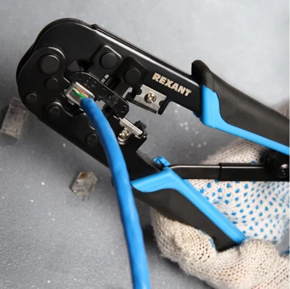 Инструмент обжимной Rexant HT-568R 12-3432-1 для RJ-45/RJ-12/RJ-11 (упак:1шт) черный/синий Инструмент обжимной Rexant HT-568R 12-3432-1 для RJ-45/RJ-12/RJ-11 (упак:1шт) черный/синий