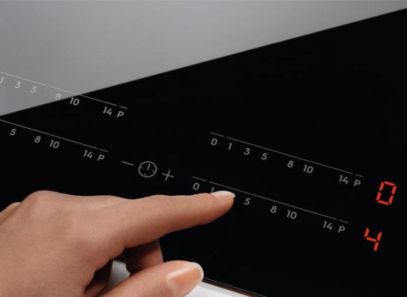 Индукционная варочная поверхность Electrolux EIV634 черный