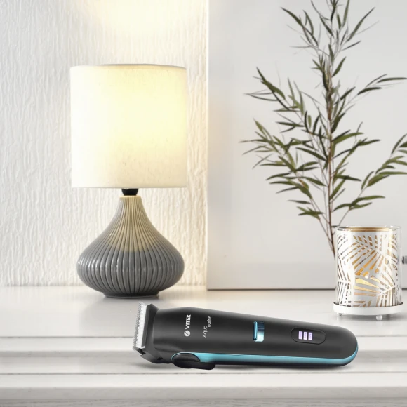 Машинка для стрижки Vitek Aquamarine VT-1353 разноцветный 4Вт (насадок в компл:6шт)