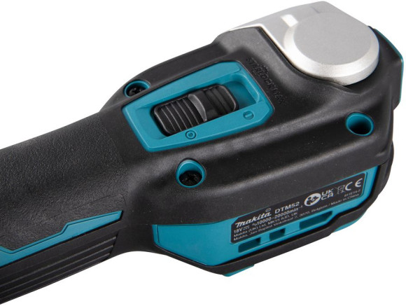 Многофункциональный инструмент Makita DTM52Z синий/черный