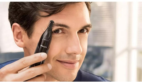 Триммер Philips NT5650/16 черный (насадок в компл:4шт) Триммер Philips NT5650/16 черный (насадок в компл:4шт)