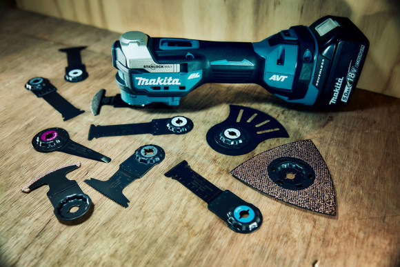 Многофункциональный инструмент Makita DTM52RTJX1 синий/черный Многофункциональный инструмент Makita DTM52RTJX1 синий/черный