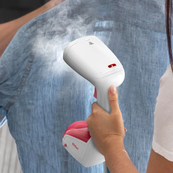 Отпариватель ручной Kitfort КТ-9233 1000Вт белый/розовый Отпариватель ручной Kitfort КТ-9233 1000Вт белый/розовый